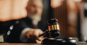 Judge hammering legal gavel