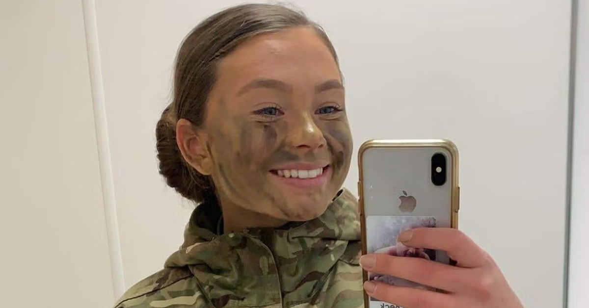 Female Army Officer Holding Phone